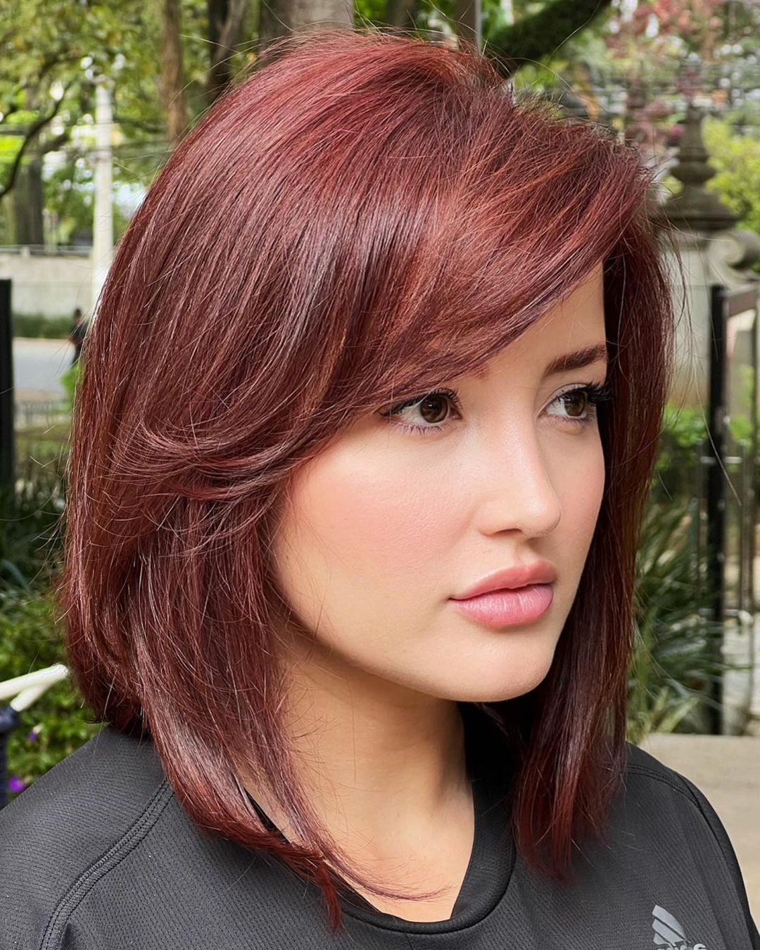 Soft Burgundy Lob with Side-Swept Bangs