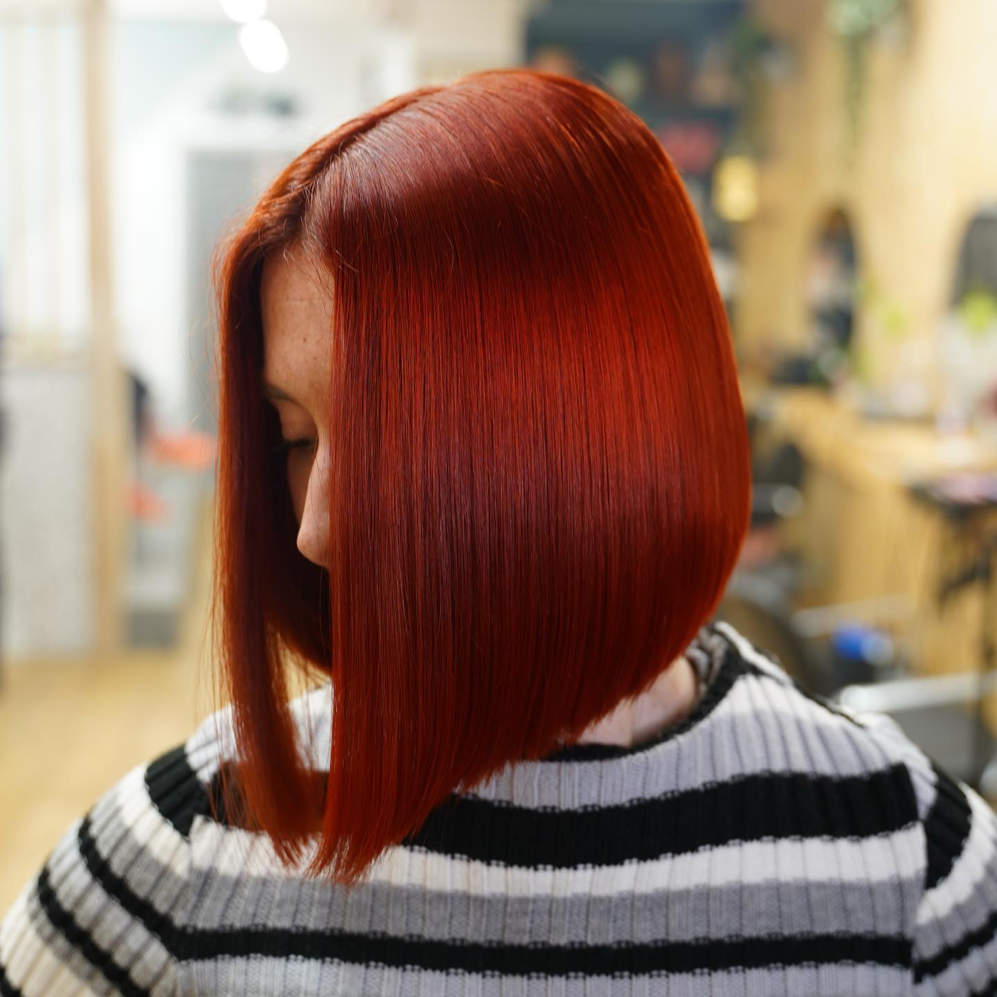 Sleek Inverted Bob in Intense Red